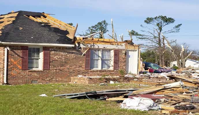 Tornado damaged house roof